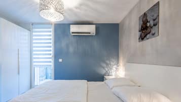 1 habitación, tabla de planchar con plancha, wifi gratis y ropa de cama