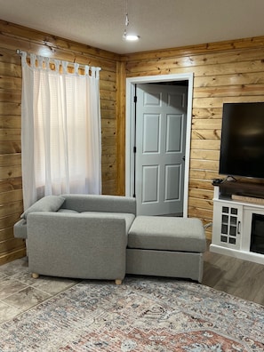 Smart TV, fireplace - Cozy 2-bedroom cabin with WiFi, AC in delightful Rock. 2 minutes from trails. (Rock)