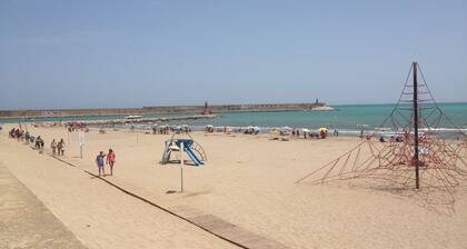 Appartement de vacances "Ătico Cesar Cataldo" prĂšs de la plage avec terrasse privĂ©e
