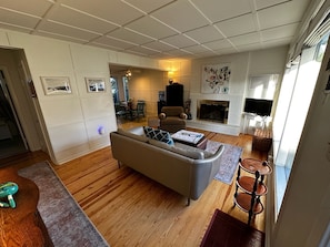 Smart TV, fireplace, books, video library
