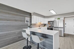 Microwave, oven, stovetop, dishwasher - Direct Oceanfront condo in Cherry Grove (North Myrtle Beach)