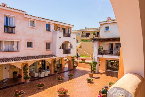 GuestHost - Porto Cervo Two-Levels Apt. W/ Balconies & Parking