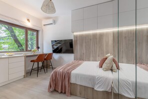 Luxury Studio, 1 Queen Bed, Non Smoking, Kitchen | Living area | 42-inch Smart TV with cable channels, Netflix, streaming services - Modern & Bright Studio on Amzei Square (Bucharest)