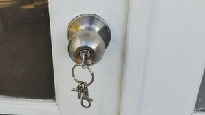A door with a keyhole and a keychain attached to it. - Private guest suite @ Sorrento (Bundall)