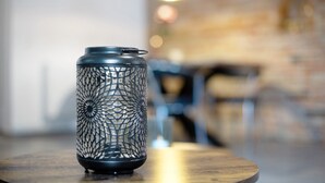 A candle holder on a round table with a blurred background. - Apartment 'Felicitas' with Wi-Fi (Tann)