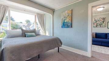 1 bedroom, desk, iron/ironing board, travel crib