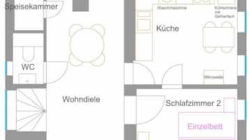 Een plattegrond van een hotel met een tweepersoonskamer, enkele kamers, een woonkamer, een eetruimte, een keuken, een badkamer en een toilet.