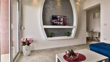 Apartment, Balcony, Sea View | Living area | TV