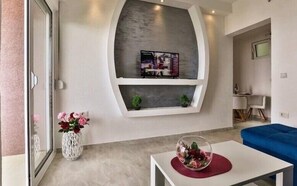 Apartment, Balcony, Sea View | Living area | TV