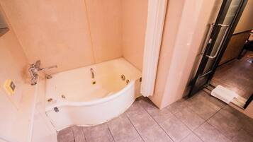 Basic Room | Bathroom | Separate tub and shower, deep soaking tub, rainfall showerhead