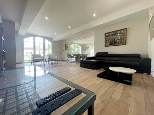One-story house in a forest park on the shore of the lake, ocean 8 km away.