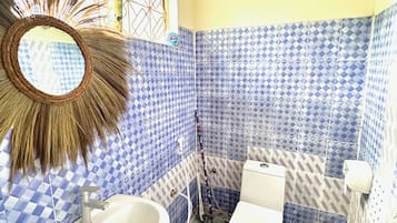 Shower, towels, soap, toilet paper