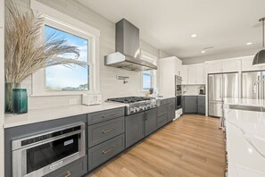 Fridge, microwave, oven, stovetop - Four Seasons 11 Bedroom Oceanfront and Soundfront Home in Hatteras (Hatteras)
