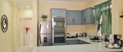 Apartment | Private kitchen | Fridge, microwave, oven, stovetop