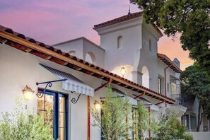 A traditional building with a white facade, arched windows, and a bell tower. - Casa De La Vina Studio 1 (Santa Barbara)