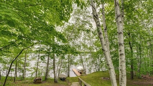 A wooden pathway leading to a dock by a lake, surrounded by birch trees. - Sullivan Lake Cabin w/ Pierz & Hillman Access! (Hillman)