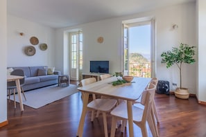 Apartment, Balcony, Lake View | Living area | 35-inch TV with digital channels - Green Rose by Wonderful Italy (Bellagio)