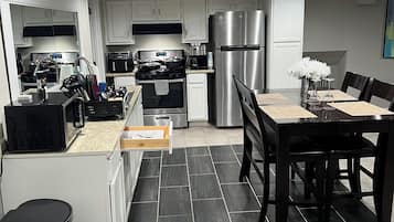 Coffee/tea maker, fridge, microwave, oven