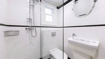 Shower, hair dryer, towels, soap