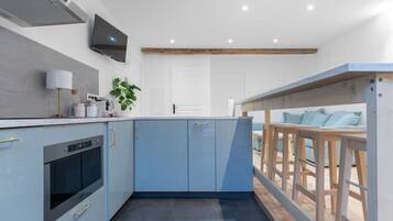 Fridge, microwave, coffee/tea maker, toaster