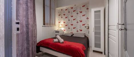 1 غرفة نوم ومكواة/لوح كي وسرير سفر وواي فاي مجانًا