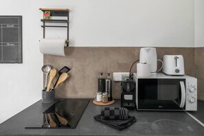 Fridge, microwave, coffee/tea maker, toaster