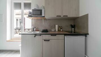 Fridge, microwave, coffee/tea maker, toaster