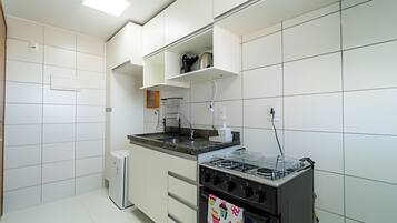 Microwave, oven, coffee/tea maker, cookware/dishes/utensils