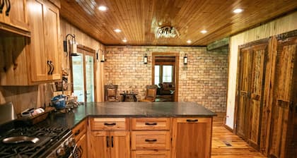 Weekend cabin retreat on a secluded 1,000 acres. Miles of hiking trails.