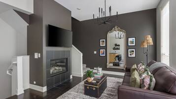 Smart TV, fireplace, books