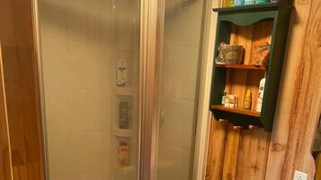 Shower, towels, soap, toilet paper