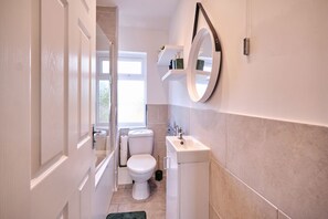 Eco-friendly toiletries, hair dryer, towels