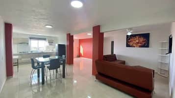 Apartment, Multiple Beds, Kitchen, Tower | Living area | Smart TV