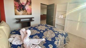 Apartamento, várias camas, cozinha, na torre | 2 quartos, edredons de pluma, ferros/tábuas de passar roupa