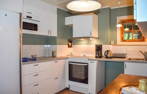 Fridge, stovetop, coffee/tea maker