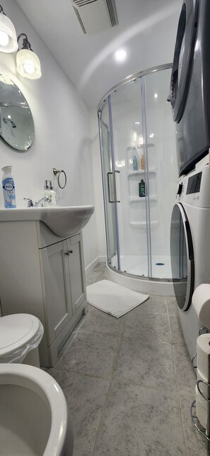 Hair dryer, towels, soap, shampoo