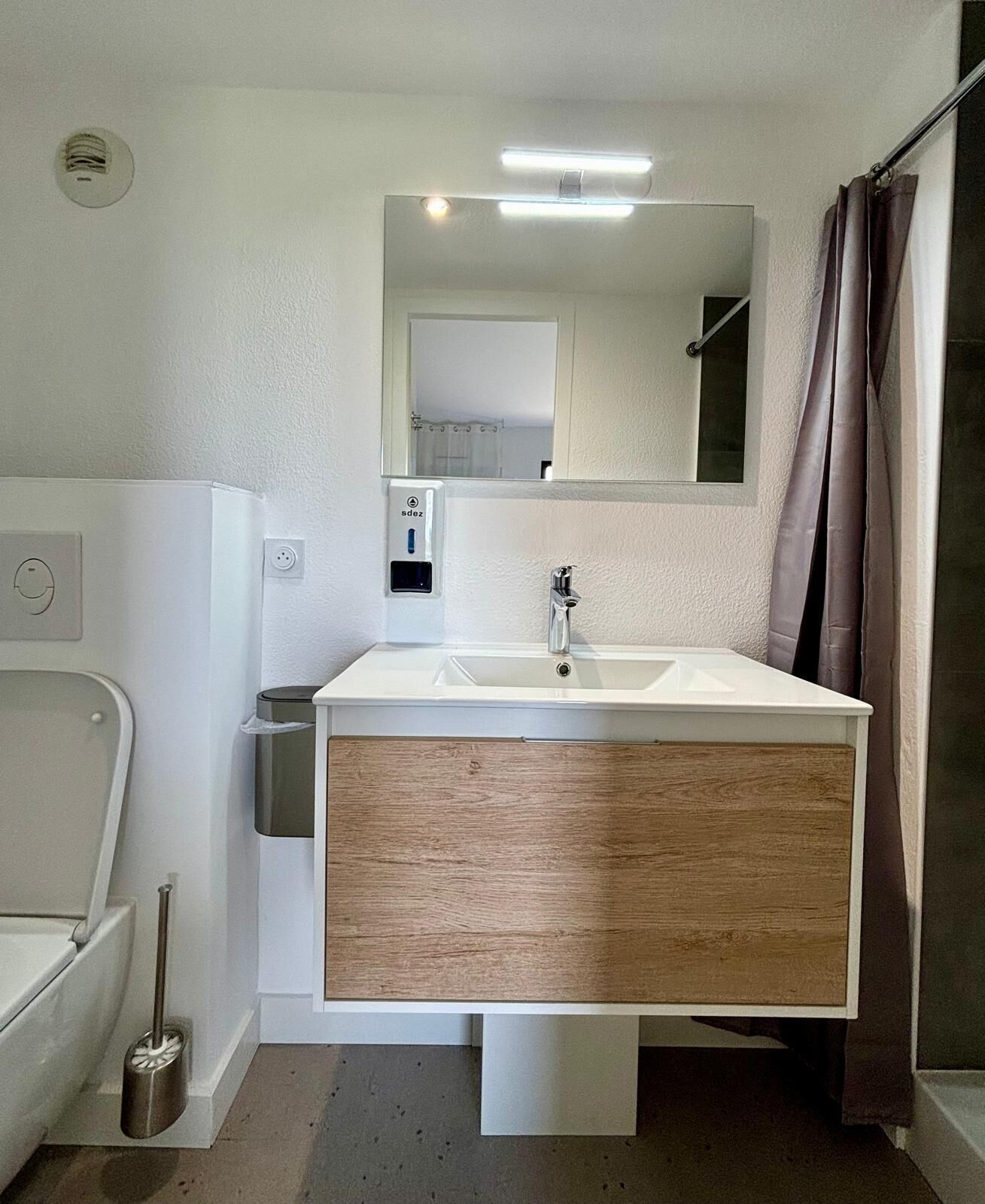 Hair dryer, towels, toilet paper