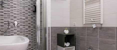 Double Room | Bathroom | Shower, hair dryer, towels, soap