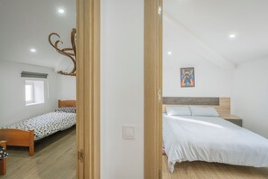 3 dormitorios, tabla de planchar con plancha, wifi gratis y ropa de cama