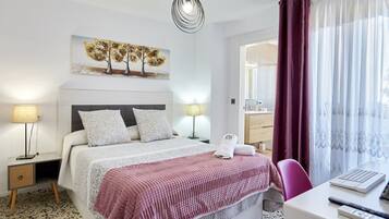 4 slaapkamers, een strijkplank/strijkijzer, gratis wifi, beddengoed