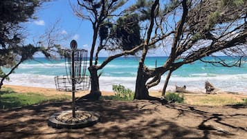On the beach, sun loungers, beach towels