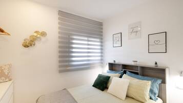 1 habitación, tabla de planchar con plancha, wifi gratis y ropa de cama