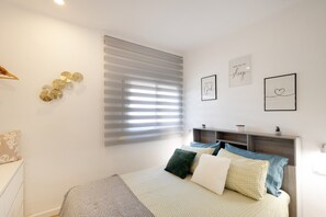 1 habitación, tabla de planchar con plancha, wifi gratis y ropa de cama 