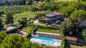 A residential property with a swimming pool, solar panels, and a garden. - Montaleo by Interhome (Casale Marittimo)