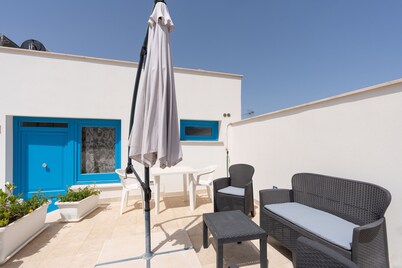 Apartment 'Appartamento Primo Piano 5' with Shared Terrace, Wi-Fi and Air Conditioning