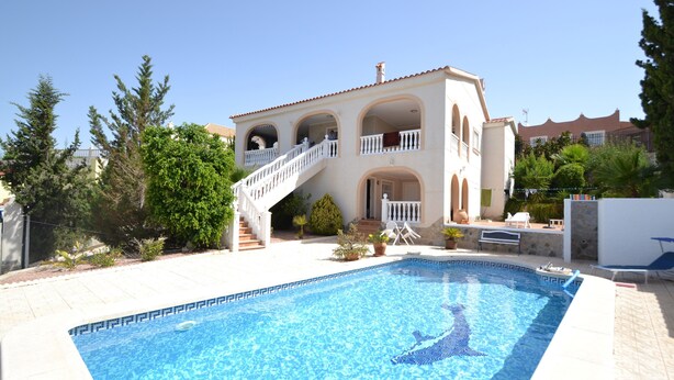 A two-story house with a swimming pool, a staircase, and outdoor furniture. - Villa 'Casa Papa' with Private Pool, Private Terrace and Wi-Fi (San Fulgencio)