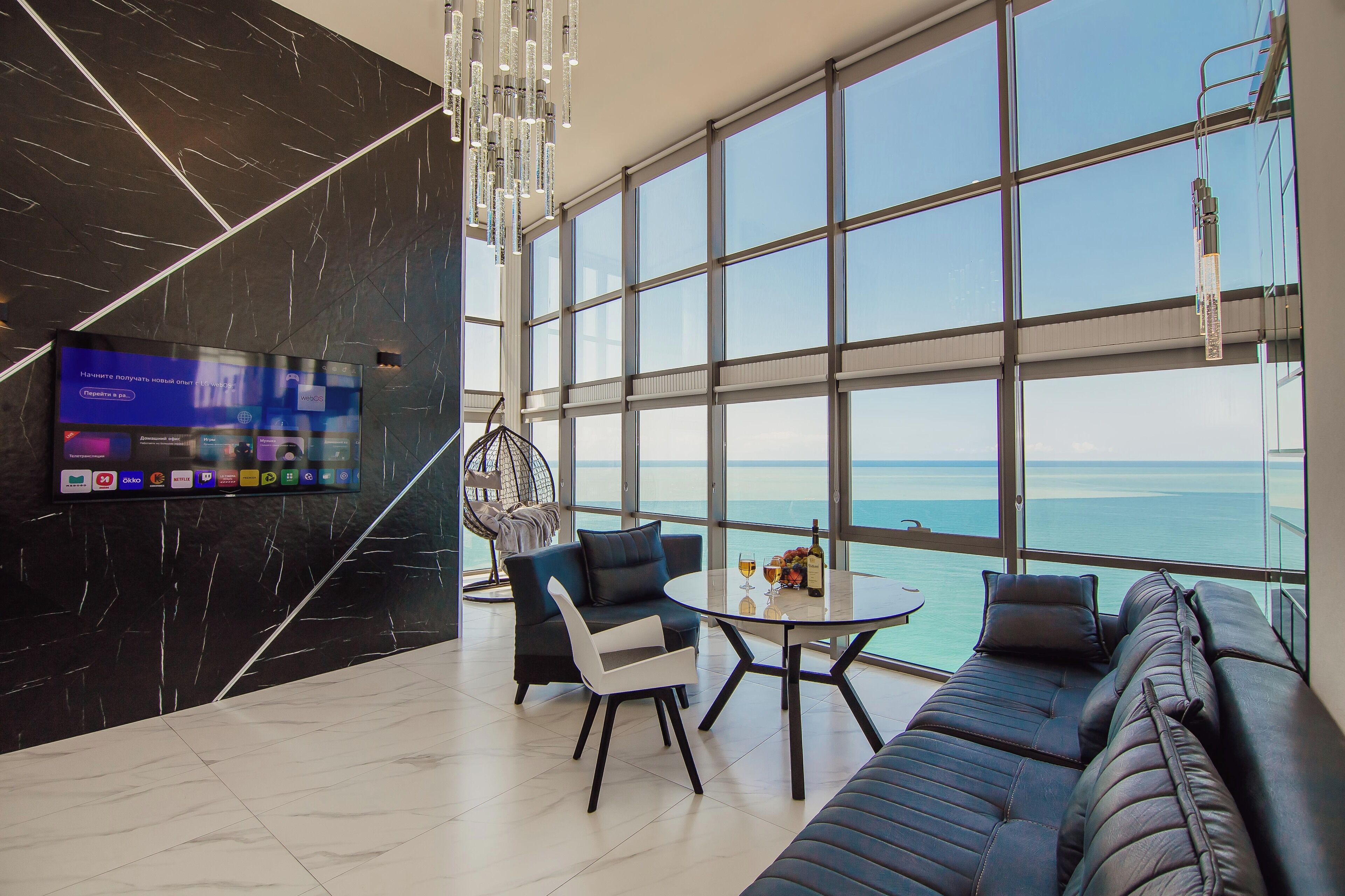 Panorama Mountain and Sea view | Living area | 45-inch Smart TV with digital channels, heated floors