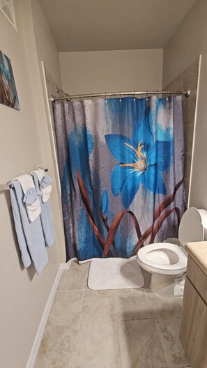 Hair dryer, towels, soap, shampoo