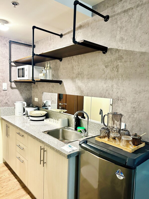 Private kitchen - Condo in Silang - Home Theater Twist w/ Loft Type Bed (Silang)