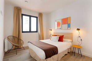 1 dormitorio, tabla de planchar con plancha, wifi gratis y ropa de cama